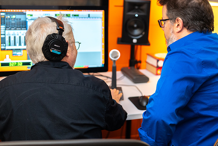 Audio Engineer and Producer working together in the studio.