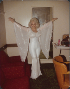 Dolly Parton in white dress